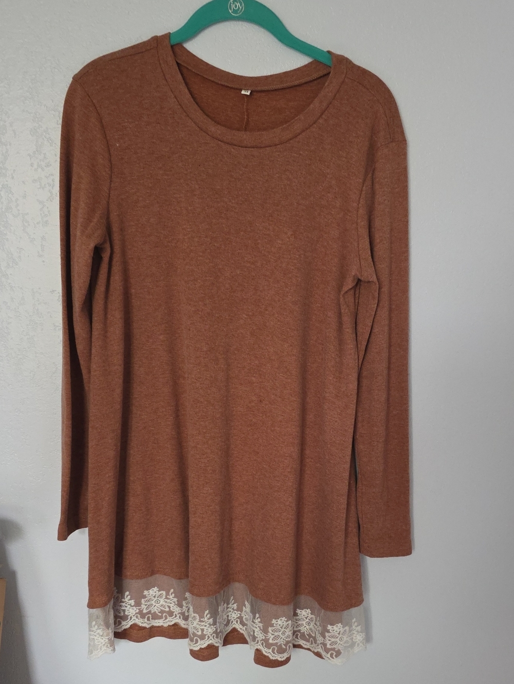 Brown Lacy Bottom Top. Looks Great With Leggings.